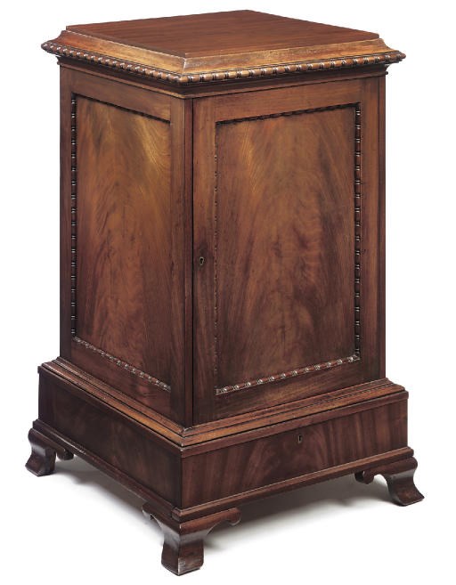A REGENCY MAHOGANY PEDESTAL CUPBOARD