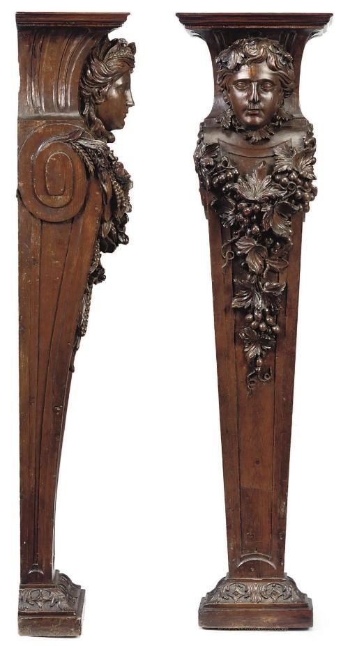 A PAIR OF GEORGE II CARVED PINE TERMS