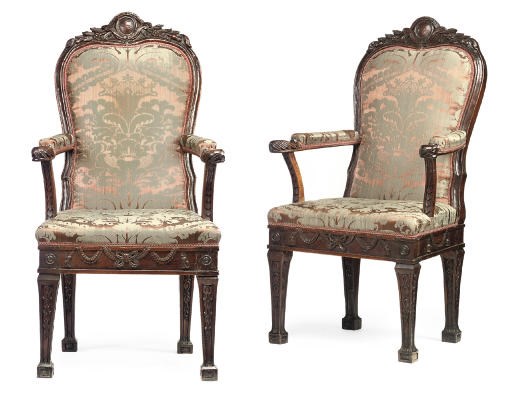 A PAIR OF NORTH ITALIAN WALNUT OPEN ARMCHAIRS