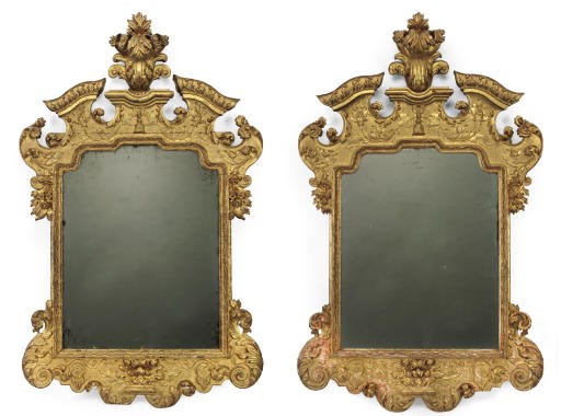 A PAIR OF NORTH GERMAN BAROQUE GILTWOOD MIRRORS