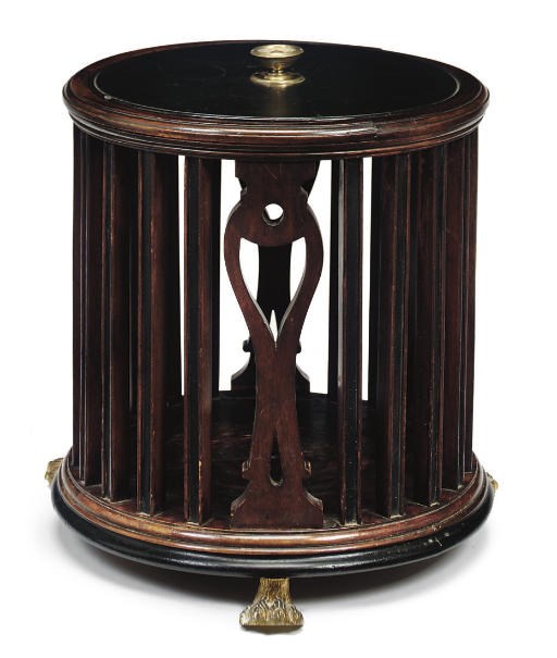 A MAHOGANY AND EBONISED PIERCED BUCKET