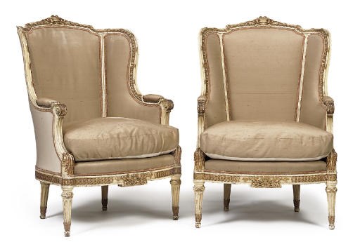 A PAIR OF FRENCH PARCEL-GILT AND CREAM-PAINTED BERGÈRES