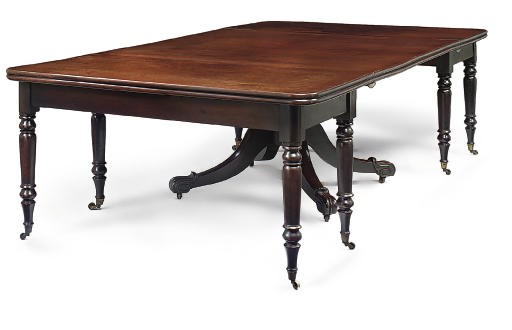 AN IRISH GEORGE IV MAHOGANY EXTENDING DINING-TABLE