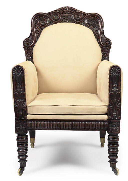 A GEORGE IV MAHOGANY LIBRARY ARMCHAIR