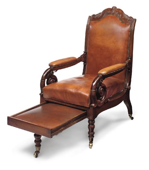 A COLONIAL MAHOGANY RECLINING OPEN ARMCHAIR