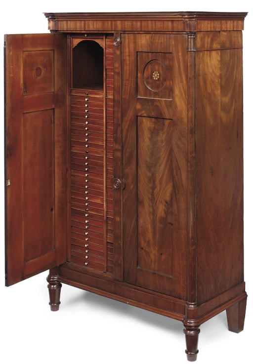 A BIEDERMEIER MAHOGANY COLLECTOR'S CABINET
