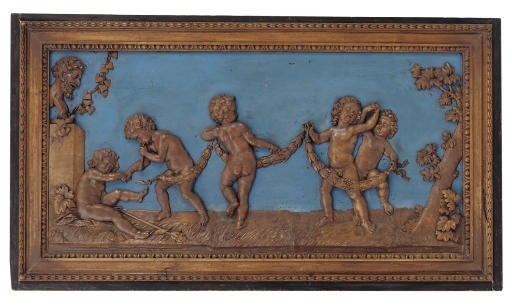 A FLEMISH CARVED WALNUT AND BLUE-PAINTED BOISERIE PANEL
