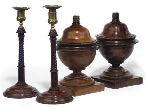 A PAIR OF TURNED WALNUT VASES AND COVERS