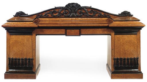 AN ANGLO-CHINESE AMBOYNA AND EBONY PEDESTAL SIDEBOARD
