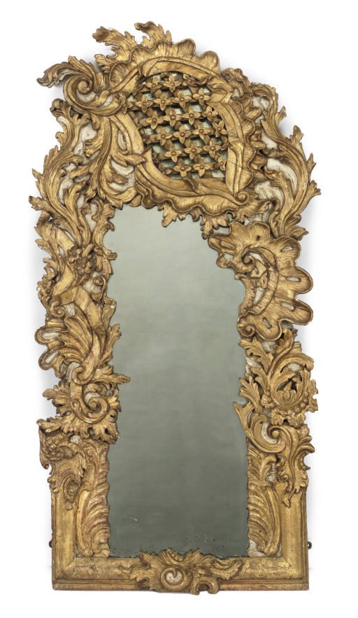 A GERMAN GILTWOOD AND CREAM-PAINTED MIRROR