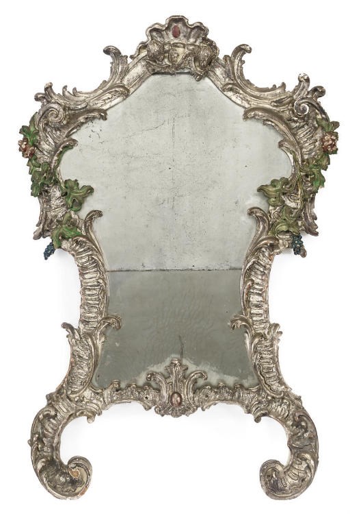 AN ITALIAN SILVER-GILT AND PART-PAINTED MIRROR