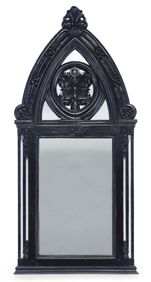 AN ANGLO-INDIAN GOTHIC EBONY MIRROR
