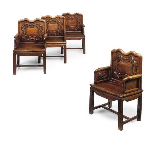 A SET OF FOUR CHINESE HARDWOOD/HUANGHUALI ARMCHAIRS