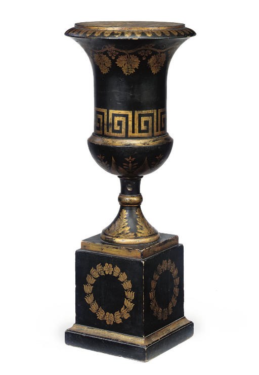 A NORTH EUROPEAN EBONISED AND PARCEL-GILT PEDESTAL