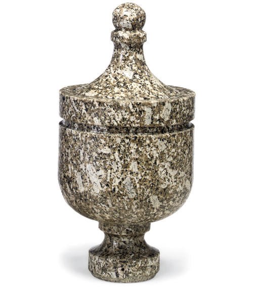 AN ITALIAN CARVED GRANITE CISTERN