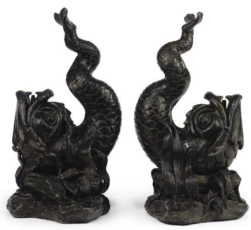 A PAIR OF LEAD FOUNTAIN SPOUTS IN THE FORM OF DOLPHINS