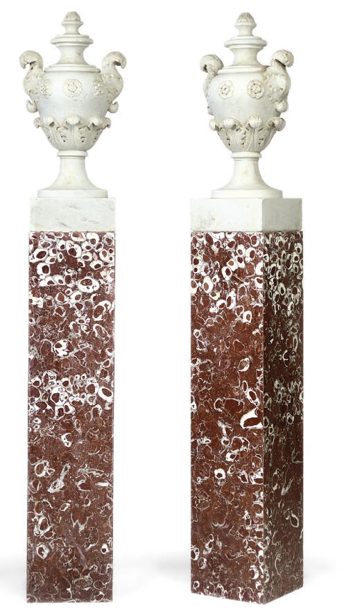 A PAIR OF ITALIAN WHITE MARBLE URNS