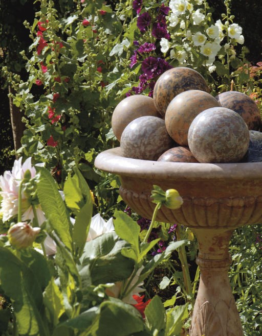 AN ITALIAN ROSSO VERONA MARBLE BOWL ON STAND
