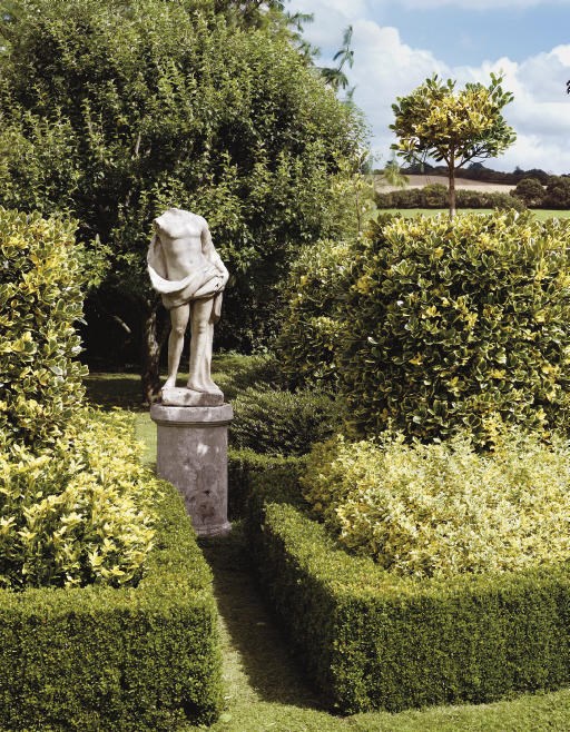 A WHITE MARBLE FIGURE OF A CLASSICAL MAN