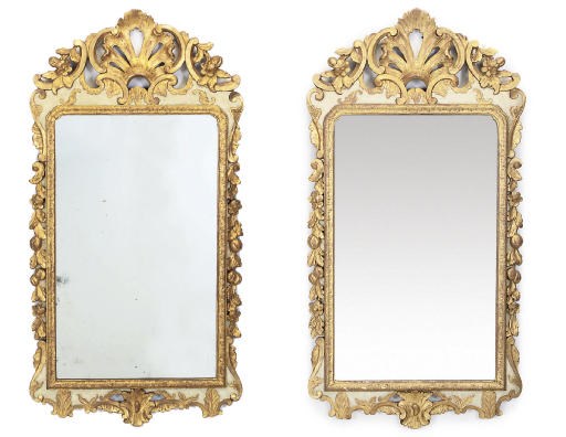 A PAIR OF CARVED GILTWOOD AND WHITE PAINTED WALL MIRRORS