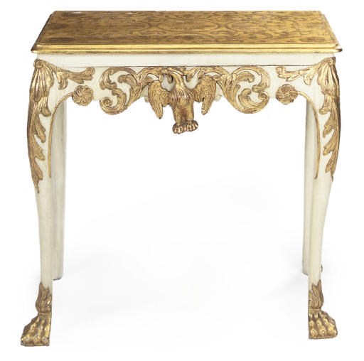 A CARVED GILTWOOD AND WHITE PAINTED SIDE TABLE