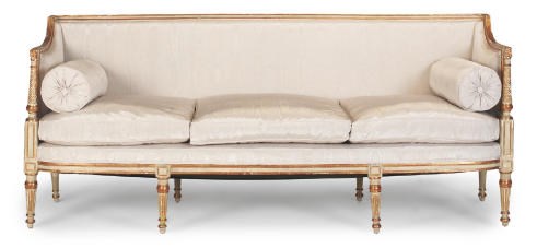 A GEORGE III WHITE PAINTED AND PARCEL-GILT SOFA
