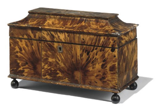 A REGENCY FAUX TORTOISESHELL VENEERED TEA CADDY