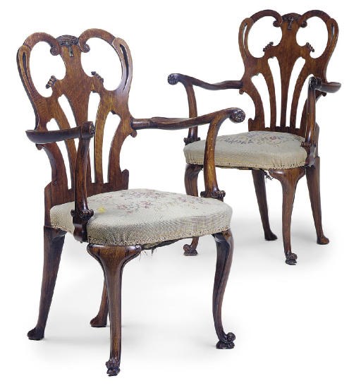 A PAIR OF WALNUT ARMCHAIRS