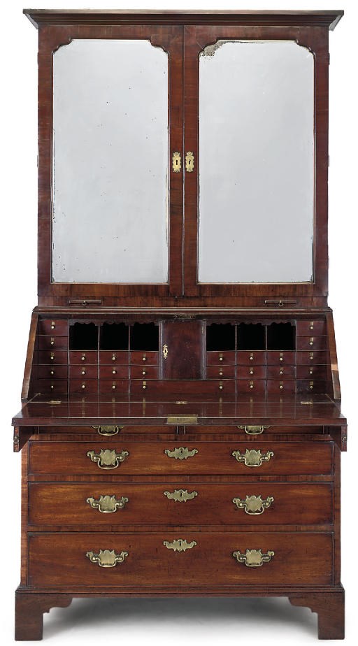 A GEORGE II MAHOGANY BUREAU CABINET