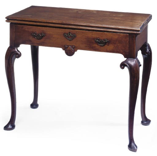 A GEORGE II MAHOGANY TEA TABLE