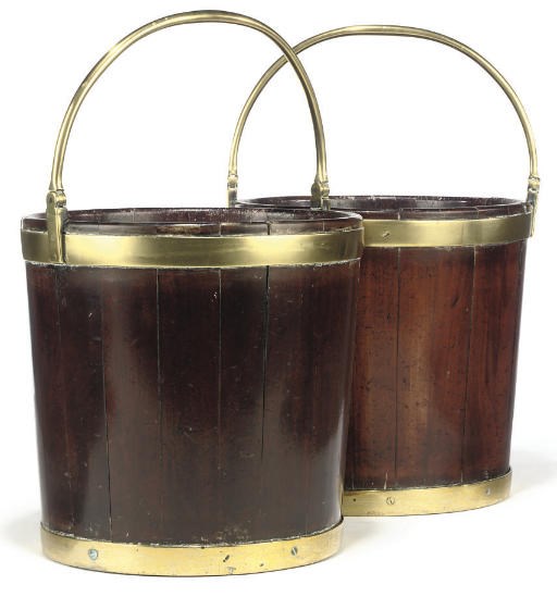 A PAIR OF IRISH GEORGE III BRASS-BOUND MAHOGANY PEAT BUCKETS