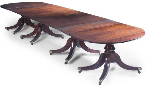 A MAHOGANY FOUR PEDESTAL DINING TABLE
