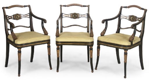 A SET OF THREE REGENCY GREEN-PAINTED AND PARCEL-GILT ARMCHAIRS