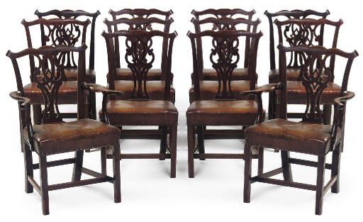 A SET OF TWELVE MAHOGANY DINING CHAIRS