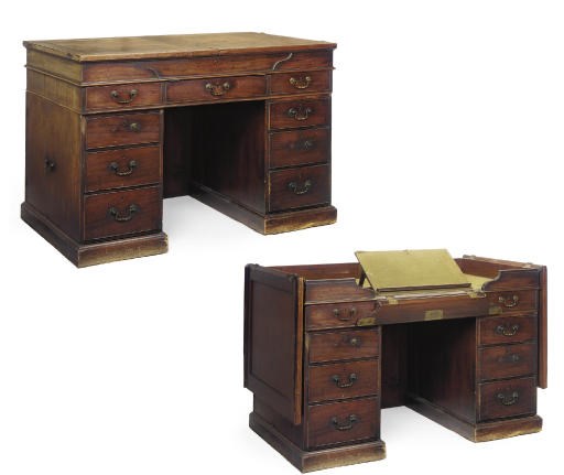 A GEORGE III MAHOGANY ENCLOSED PARTNERS PEDESTAL DESK