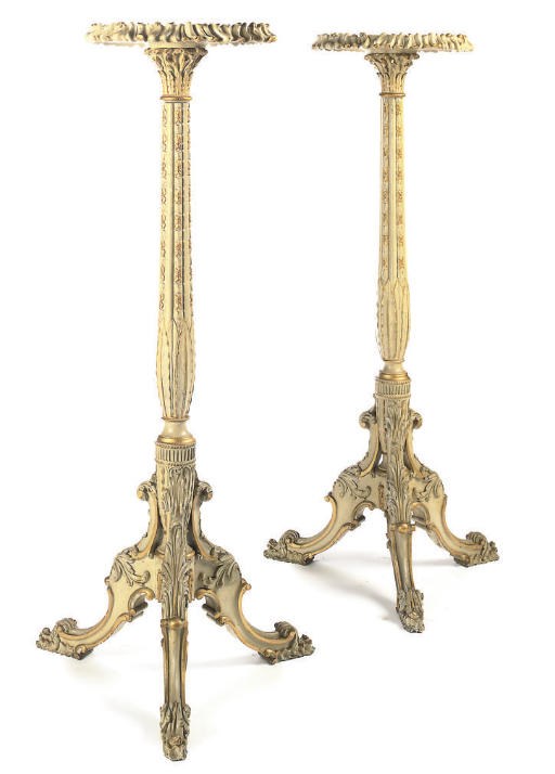 A PAIR OF WILLIAM IV PARCEL-GILT AND CREAM PAINTED MAHOGANY TORCHERES