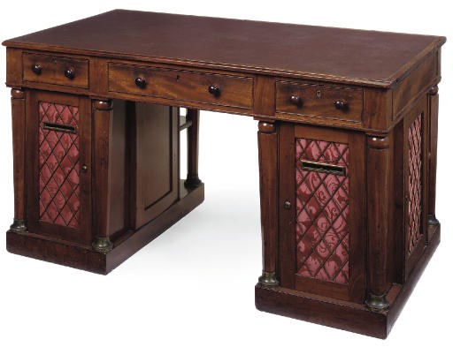 A LATE REGENCY MAHOGANY KNEEHOLE DESK