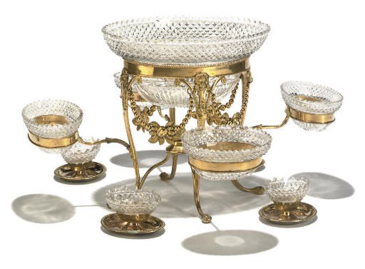 A LATE REGENCY GILT-BRASS, SILVER-GILT AND CUT GLASS EPERGNE