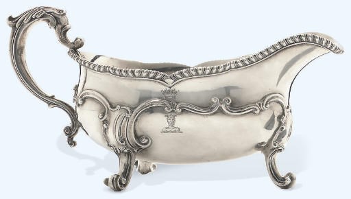 A LARGE GEORGE III SILVER SAUCEBOAT