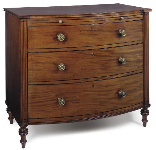 A REGENCY MAHOGANY AND LINE INLAID BOWFRONT CHEST
