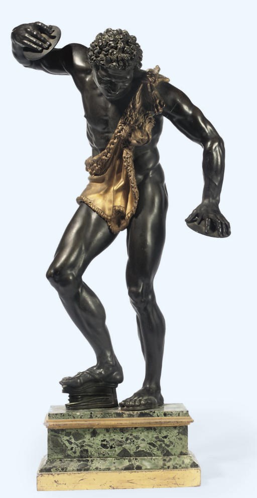 AN ITALIAN BRONZE AND GILT-BRONZE MODEL OF THE FAUN WITH CLAPPERS