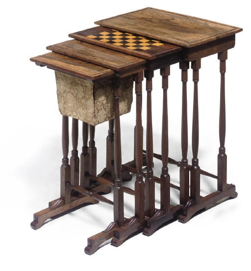 A SET OF ROSEWOOD QUARTETTO TABLES
