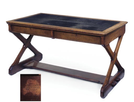 A LATE VICTORIAN OAK LIBRARY TABLE