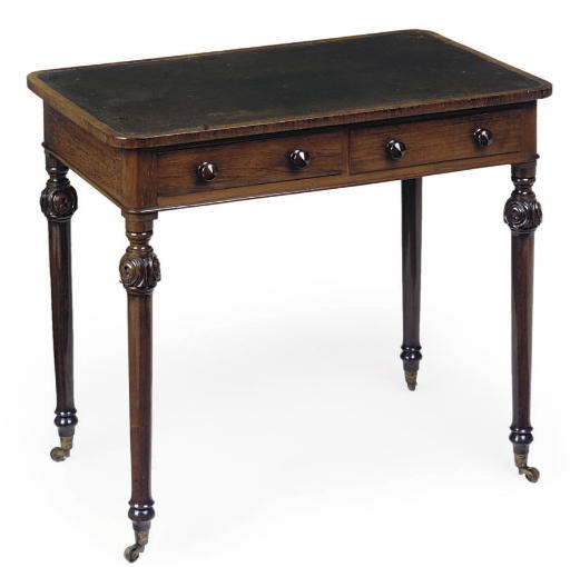 AN EARLY VICTORIAN ROSEWOOD WRITING TABLE