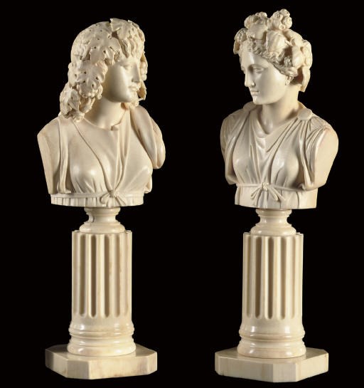 A PAIR OF IVORY BUSTS OF THALIA AND MELPOMENE
