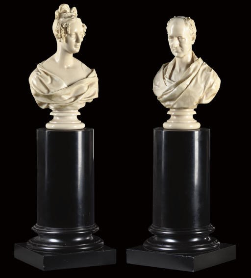 A PAIR OF LATE REGENCY IVORY BUSTS OF A GENTLEMAN AND LADY