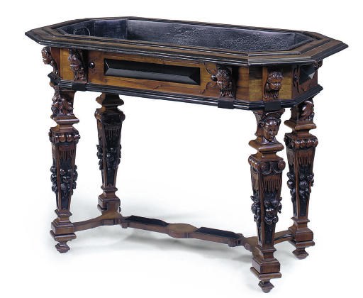 A NORTH EUROPEAN WALNUT AND EBONISED JARDINIERE