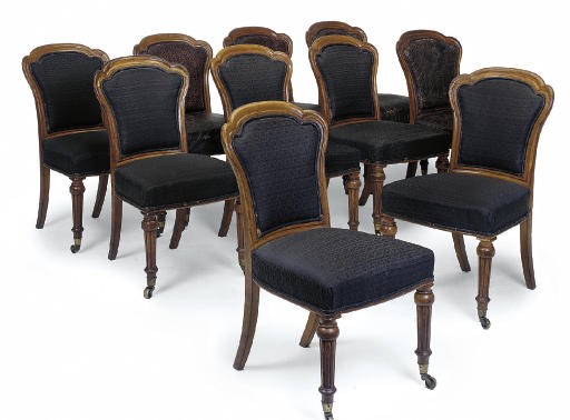 A SET OF TEN EARLY VICTORIAN OAK DINING CHAIRS
