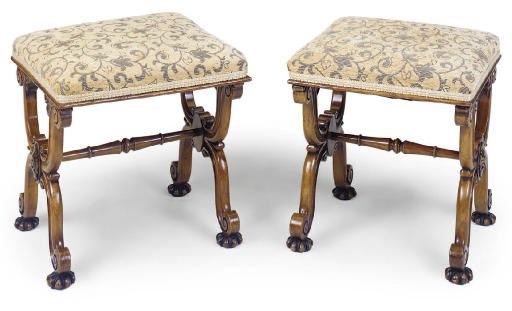 A NEAR PAIR OF VICTORIAN WALNUT STOOLS