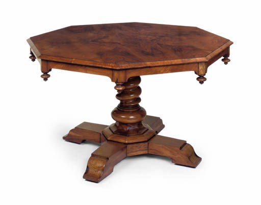 A VICTORIAN WALNUT OCTAGONAL CENTRE TABLE